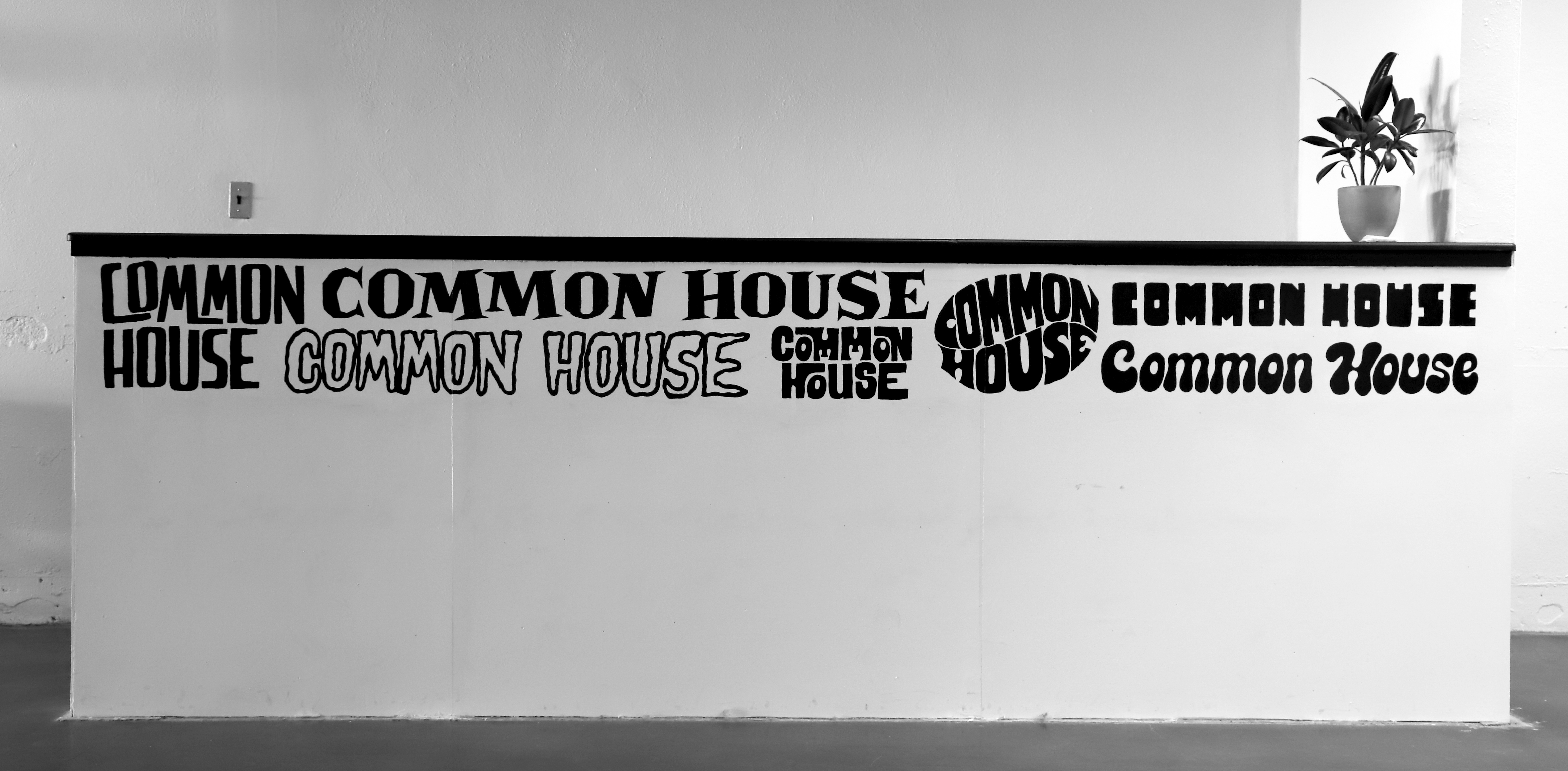 Mural of Common House logos